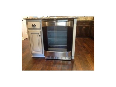 Center Island Features Beverage Fridge!