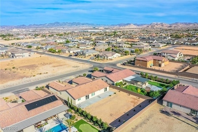 Aerial view of residential area with mountains