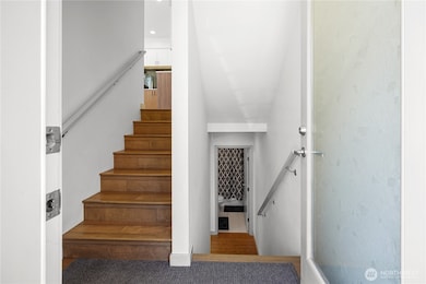 Upstairs to the main living; down to 2 additional BRs and a full bath