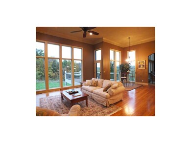 Spacious hearth room, breakfast nook has walls of 