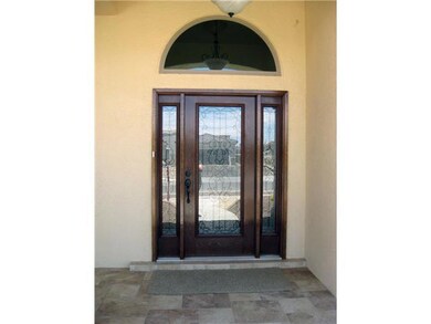 Wrought Iron detail in door with privacy