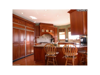 Kitchn with built in refrigerator, freezer, commer
