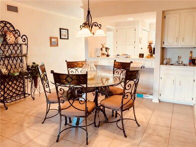 Dining  area with wet bar.