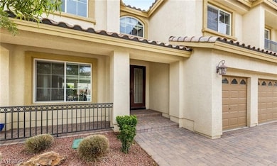 Entrance to property featuring a garage, stucco siding, a tile roof, and a porch