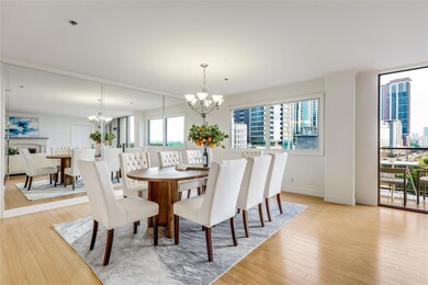 Dining room featuring baseboards, a chandelier, a