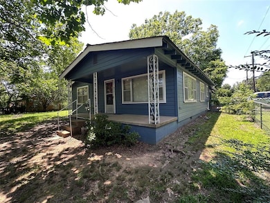 View of front of home with covered porch and crawl space