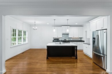 Gourmet kitchen with carrara marble countertops an