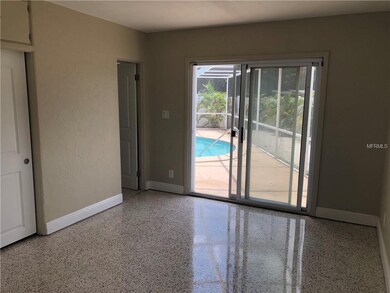 MABR with sliders to pool and patio.
