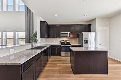 Kitchen featuring stainless steel appliances, a s