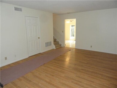 Spacious living room with new flooring!