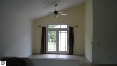 French Doors leading to concrete patio