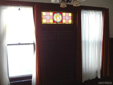 Dining Room. Dining room with beautiful stained gl