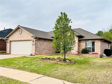Single story home with an attached garage, drivewa