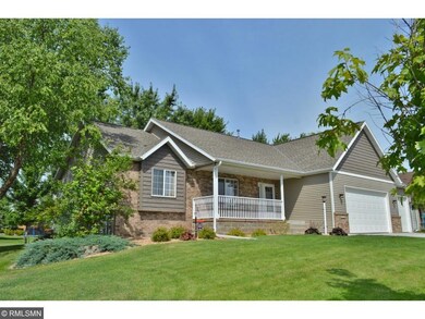 Beautiful landscaping, covered front porch!