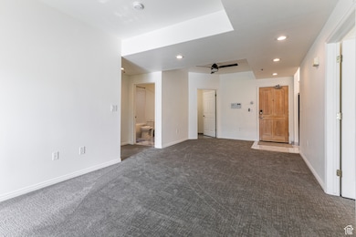 Unfurnished room with recessed lighting, carpet, and ceiling fan