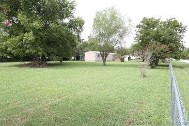 From front corner of lot looking toward the house.