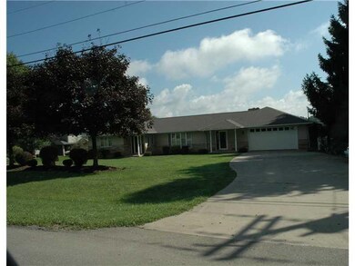 Exterior Front. 2 car attached garage is over size