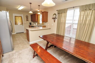 A breakfast area adjoins the kitchen with ample sp