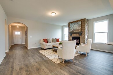 Conversation pit around the natural gas fireplace with plenty of room to do extra