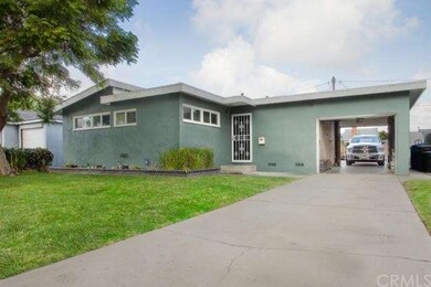 Long Driveway With Automatic Double Doors.