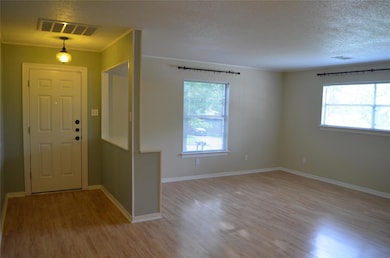 Foyer entrance featuring light wood-style floorin