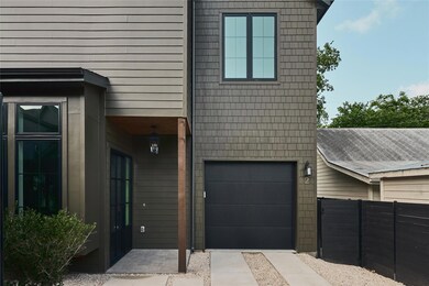 View of front facade with an attached garage