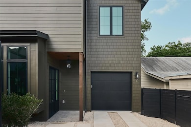View of front facade with an attached garage