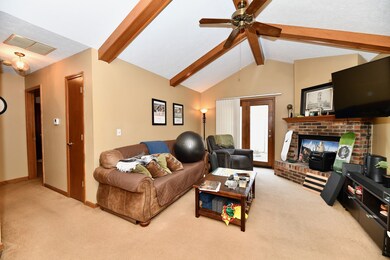 Family room with wood buring fireplace
