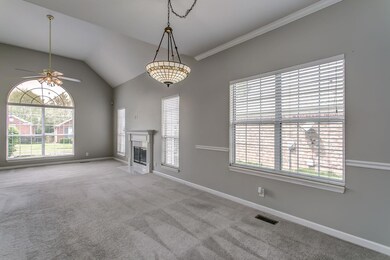Another view of huge Family Room. Dining Room is connected, creating an open and flowing layout. Perfect floor plan for entertaining.