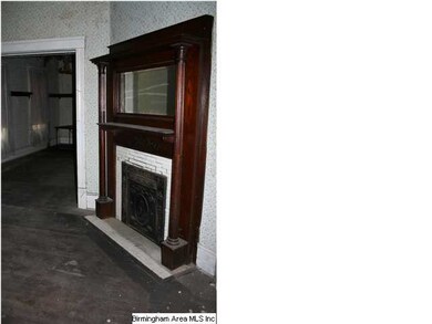 One of the numerous fireplaces as you enter the ho