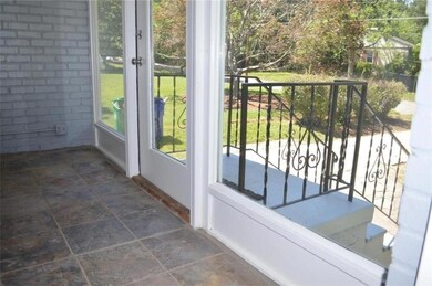 Entryway with stone finish floors and stairs