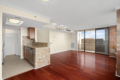 Bright and inviting, this open living and dining area is filled with natural light and flows seamlessly into the kitchen. The tucked-away layout offers both openness and privacy — perfect for relaxing or entertaining.