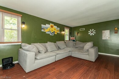 Living room featuring wood-type flooring