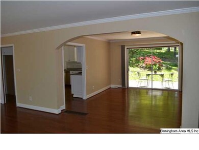 Gleaming hardwoods and open floor plan with tremen