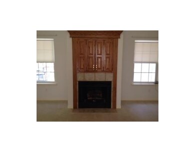 Living Room. Gas log fireplace.