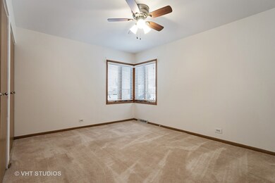 Newer windows and a full master bath make this lar