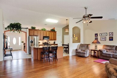 Kitchen overlooking family
