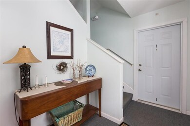 Secure & inviting front entrance to...