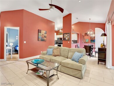Living area with light tile patterned floors, base