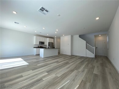 Unfurnished living room featuring light wood finis