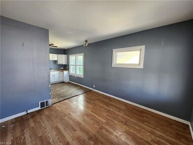 View of wood floored spare room