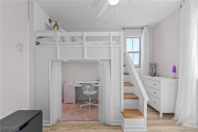 Upstairs Bedroom with Custom Lofted Built-In and C