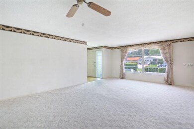 Living/dining with large windows and lots of sunli