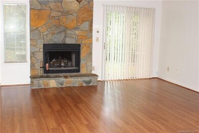 Great Room with new laminate floors, ceiling fan, 