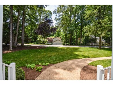 Aggregate walkway leading to the front porch.