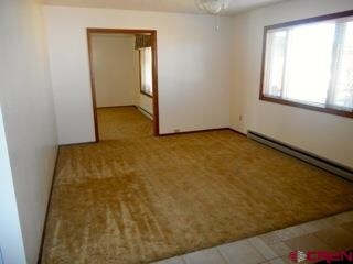 Adjoining the living room on one side is a huge fa