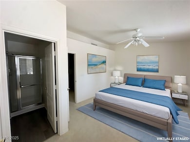 Bedroom with ceiling fan and visible vents