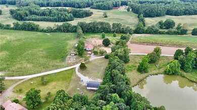 View of rural area with a nearby body of water