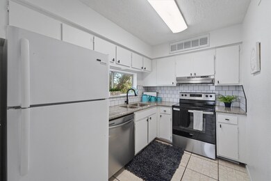 New stainless dishwasher, stove and refrigerator i