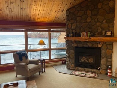 Sitting room featuring lofted ceiling, wood ceilin